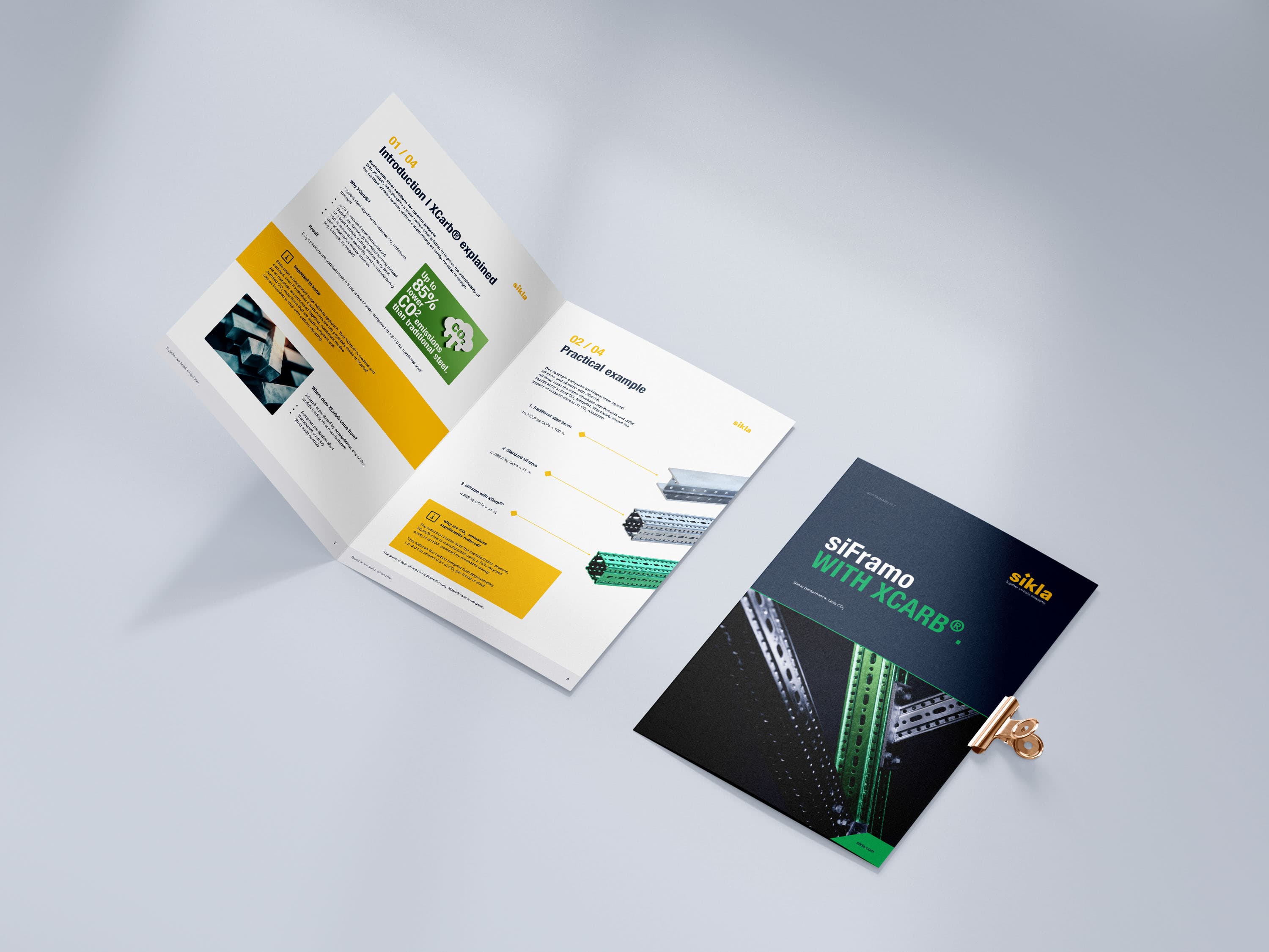 Open brochure titled "siFramo with XCARB®" on a light surface, featuring images and text on sustainable building solutions.
